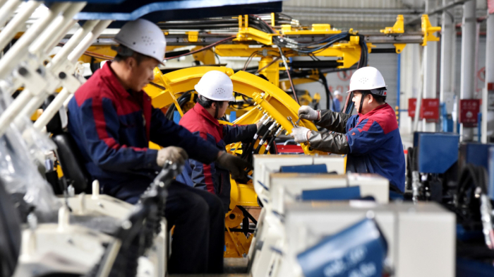 China’s factory and retail growth falters as economic pressures mount