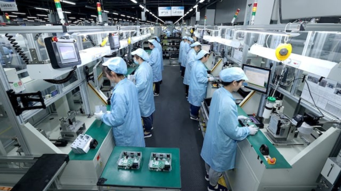 China’s factory and retail growth slow sharply as economic headwinds intensify