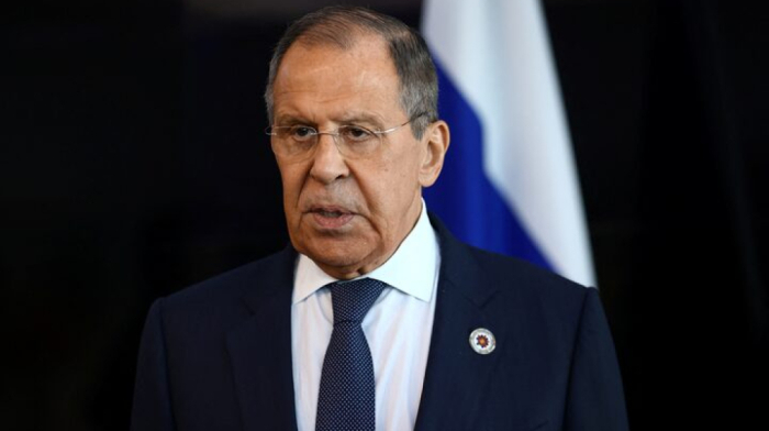Russian foreign minister wears USSR jumper as he arrives at Trump-Putin summit in Alaska