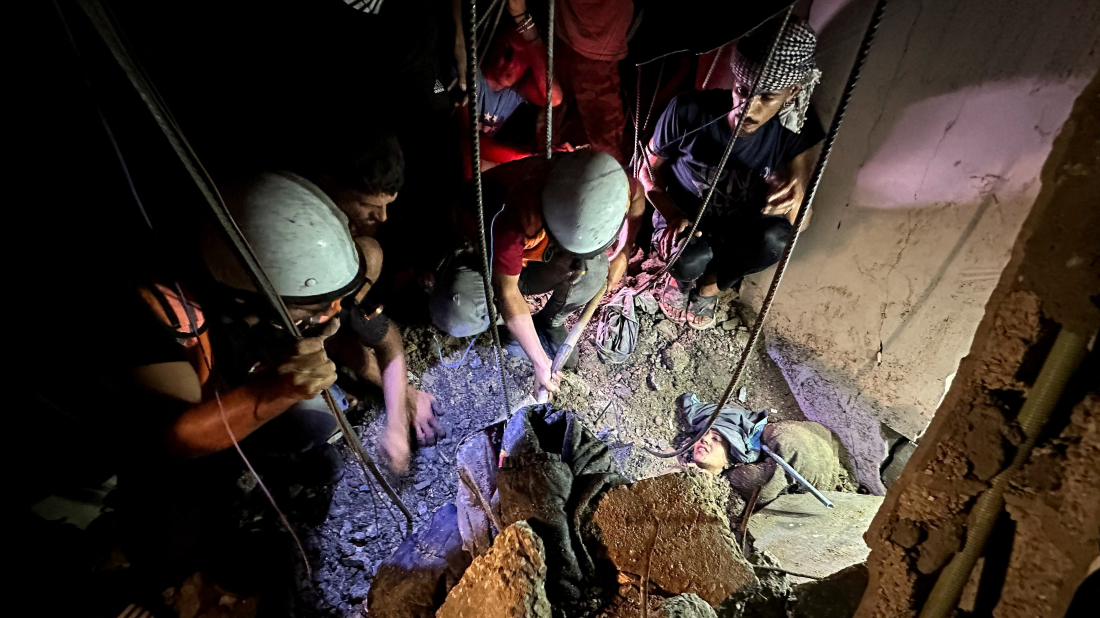 Palestinian woman rescued from rubble as Gaza hospitals struggle under Israeli airstrikes
