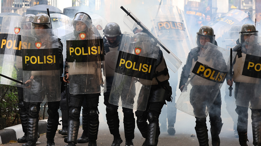 Protesters and police clash outside Indonesia's parliament over legislator salaries