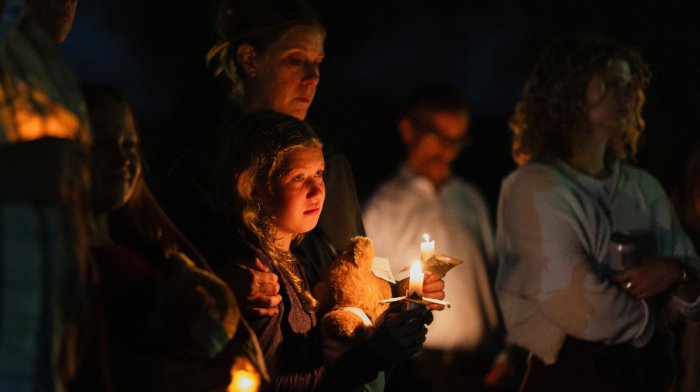 Communities gathered at candlelight vigil after deadly church shooting killed two children in Minneapolis