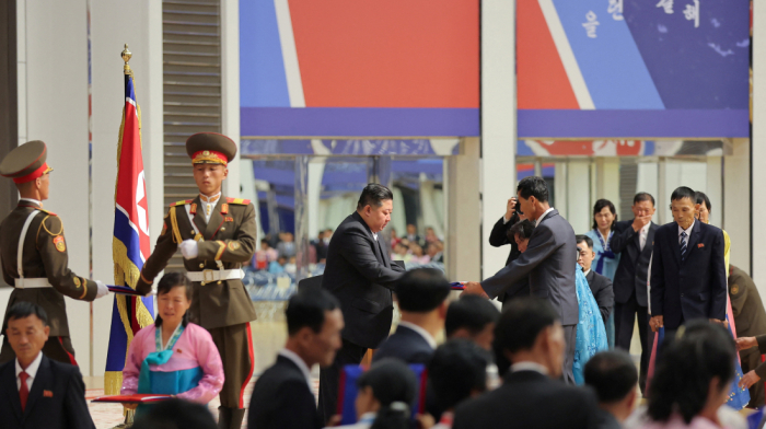 Kim Jong Un inspects new missile production line ahead of Beijing trip