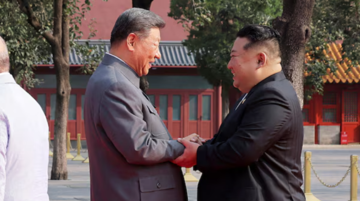 North Korea's Kim tells China's Xi his country will support China's interests, KCNA says