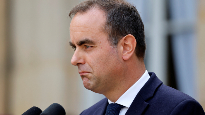 France's new prime minister takes office amid anti-government protests