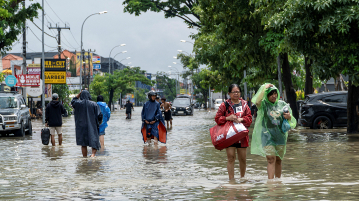Floods in Bali killed at least 14 people and displace hundreds