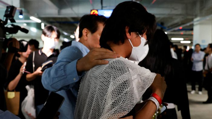 South Korean workers return home a week after immigration raid