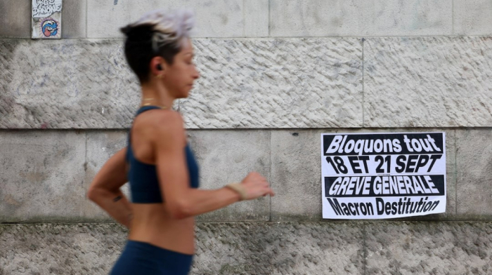 French workers strike against austerity as Macron faces pressure over budget cuts