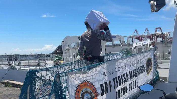 Coast guard delivers more aid for central Philippines quake victims
