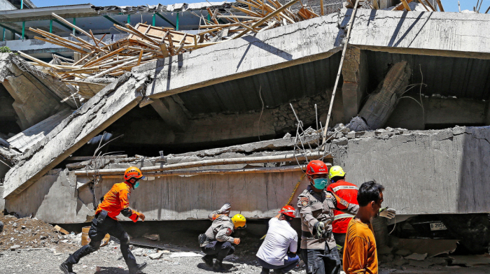 At least 50 bodies recovered after Indonesian school collapse, 13 remain missing
