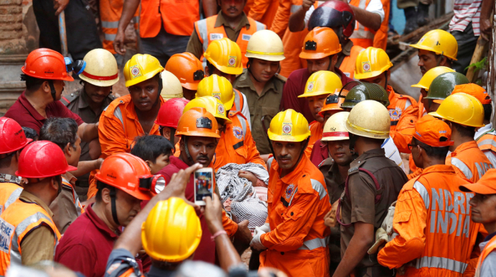 At least 15 killed as landslide crushes bus in northern India