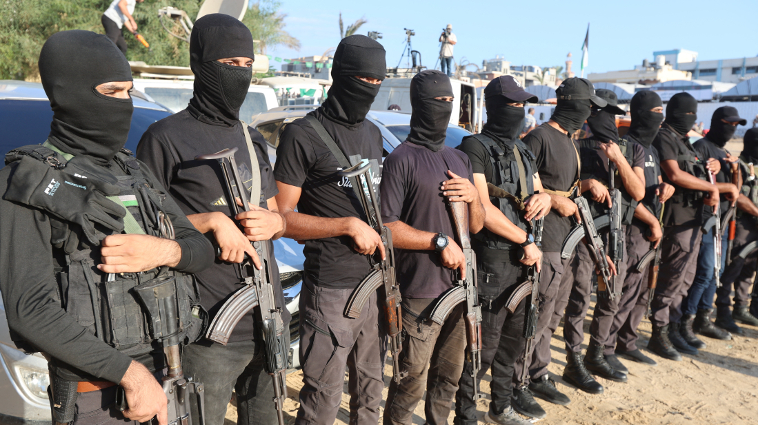 Hamas deploys fighters as hostages released, in show of strength