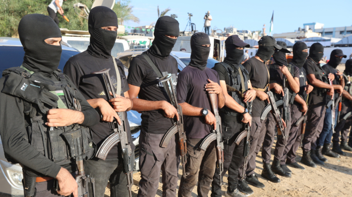 Hamas deploys fighters as hostages released, in show of strength
