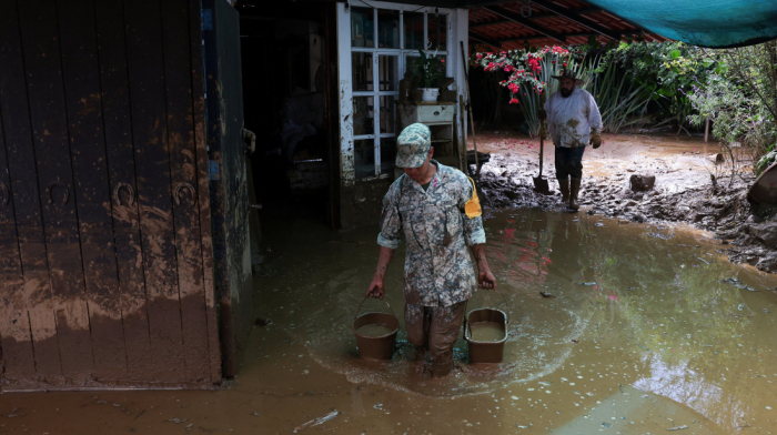 Heavy rains flood Mexico towns, leave nearly 130 dead
