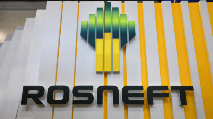 U.S. hits top Russian oil companies with sanctions, EU bans Russian LNG