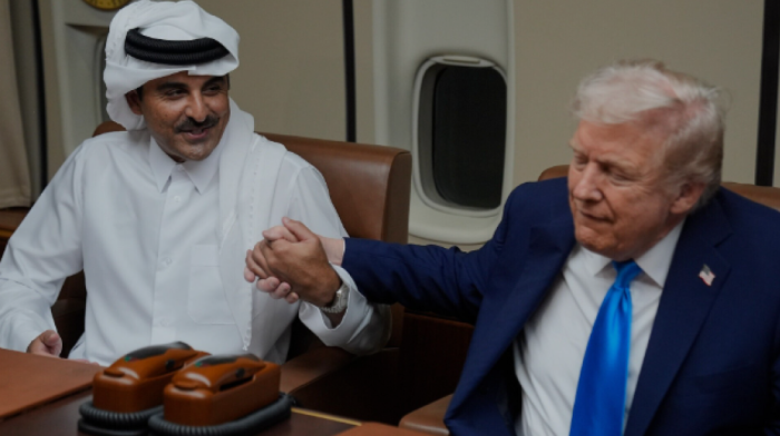 Trump meets with Qatar's Emir aboard Air Force One