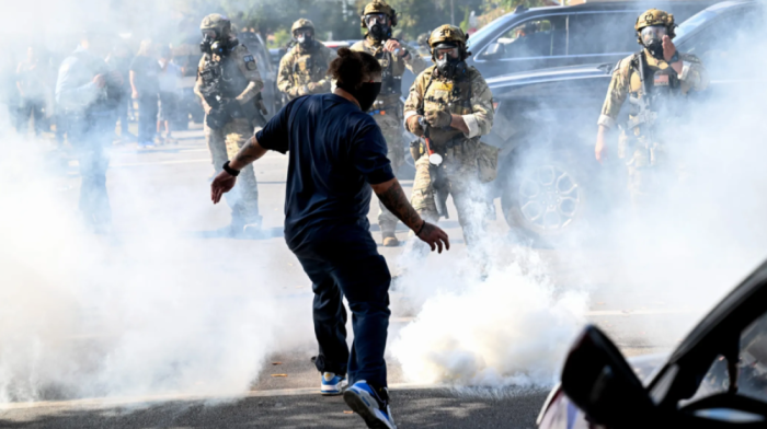Tear gas and arrests as immigration raid sparks chaos in Chicago neighborhood