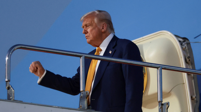 Trump targets China trade deal as he arrives in Tokyo on Asia tour