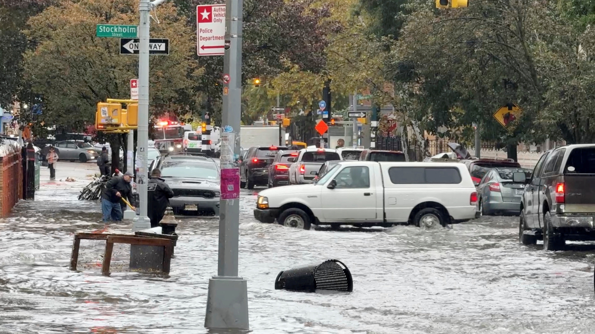 Heavy rains in New York kill two, disrupt flights