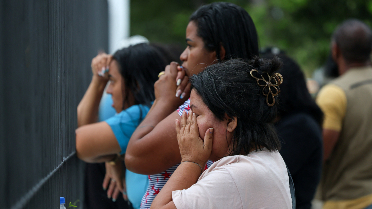 Families cluster at Rio morgue looking for answers after deadly police raids