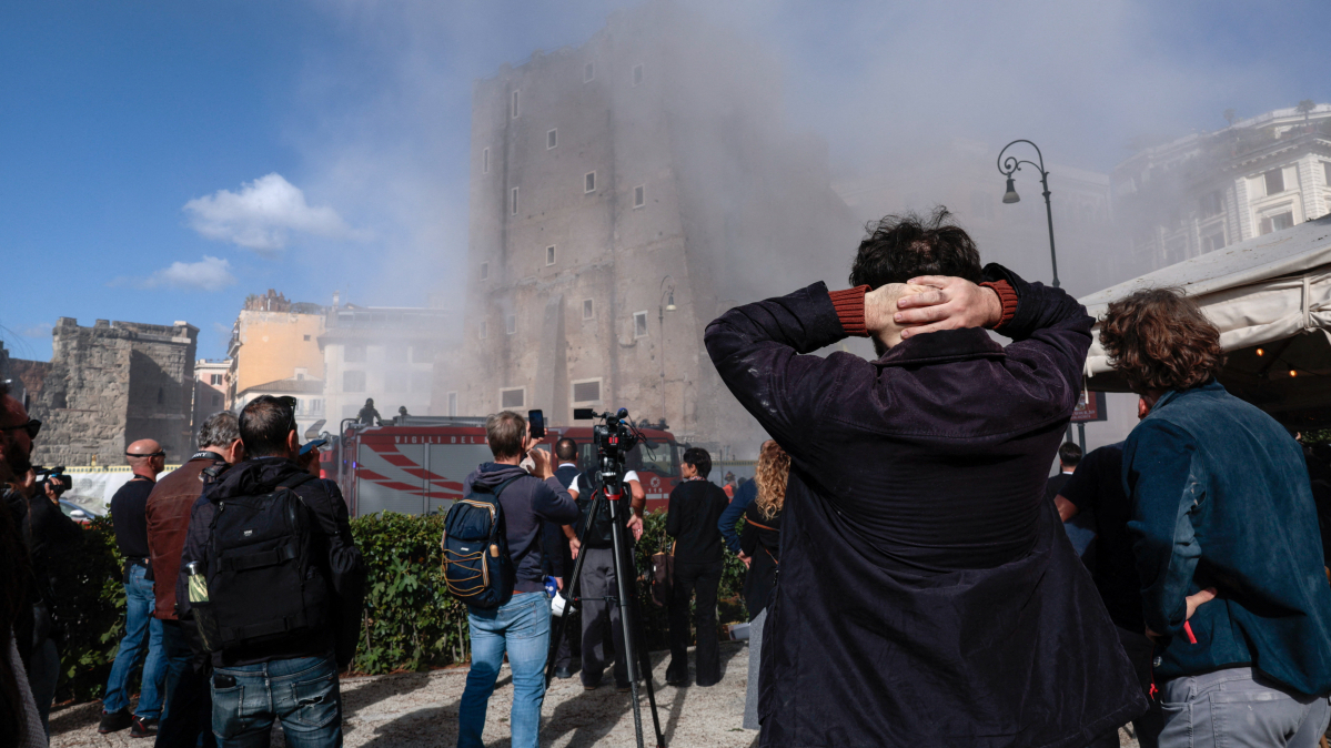 Rome firefighters battle to rescue worker trapped under collapsed medieval tower