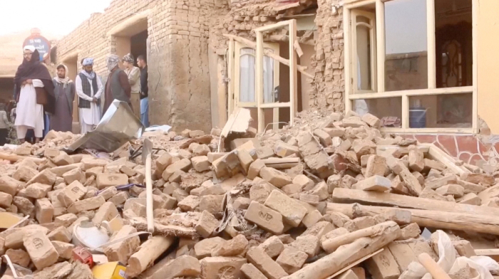 Afghans begin clean-up after powerful earthquake that killed 20