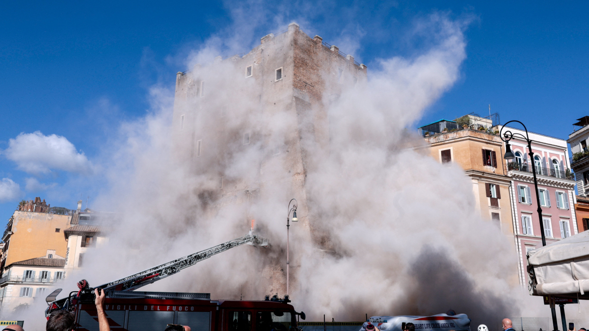 Worker trapped under collapsed medieval tower in Rome dies