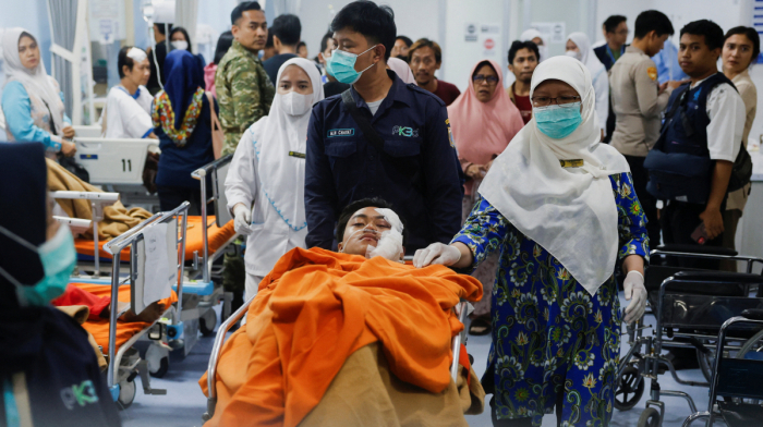 Blasts injure dozens at Indonesian mosque, student suspected