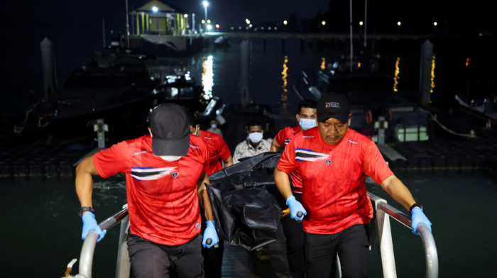 Malaysia searches for Rohingya after boat sinks as death toll climbs to 21