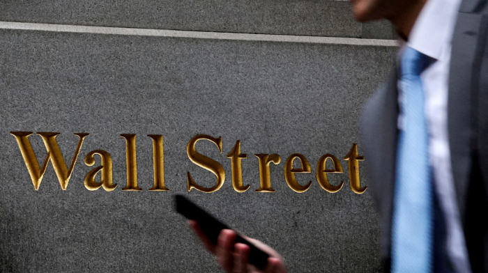 Wall Street sinks as investors fret about rate cuts