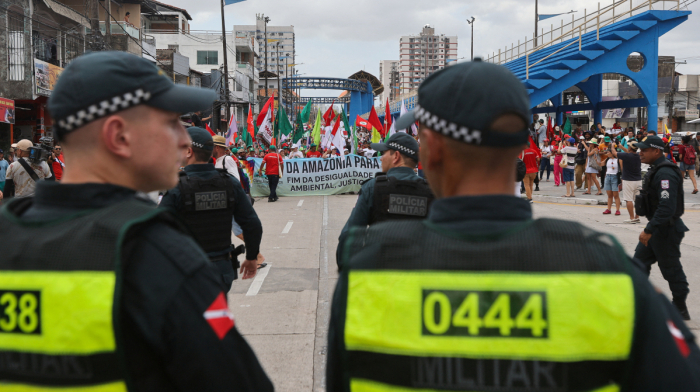 Climate protesters swelter in Brazilian sun outside COP30 summit