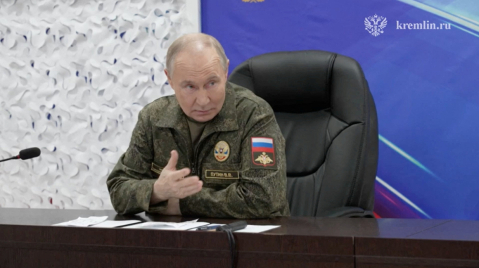 Putin visits Russian 'West' command post and urges Ukrainian forces to surrender