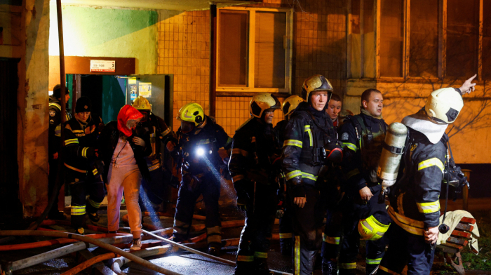 Russian drones trigger fires in Kyiv apartment buildings, officials say