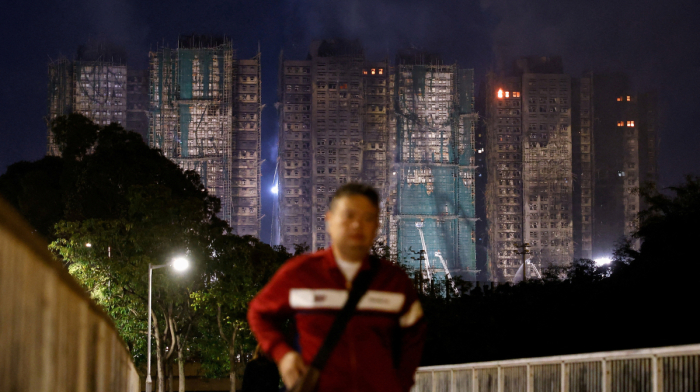 Hong Kong fire update: 65 dead in apartment complex blaze with hundreds still missing