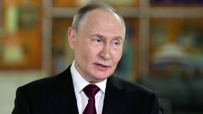 Putin hails drop in inflation, plans to deepen ties with India and China