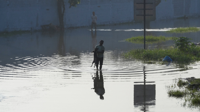 Death toll from Asia floods surpasses 1,200 as search for missing continues