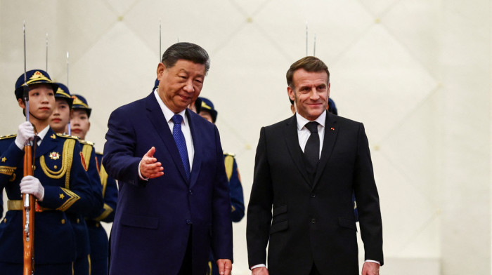China's President Xi Jinping meets French President Emmanuel Macron