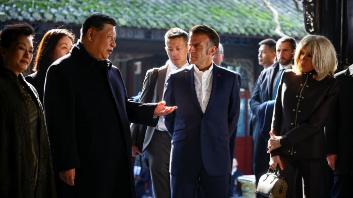 Xi woos Macron with sightseeing trip, but little in way of deals