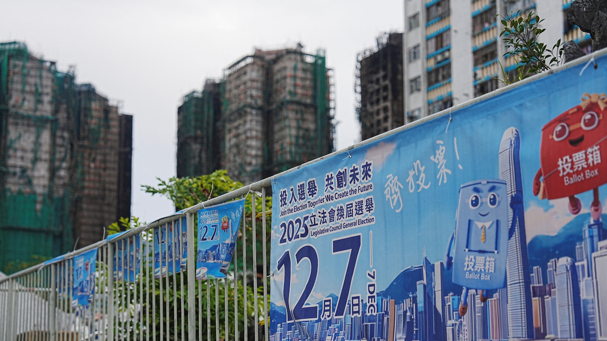 Grief overshadows Hong Kong polls as city mourns deadly tower block blaze