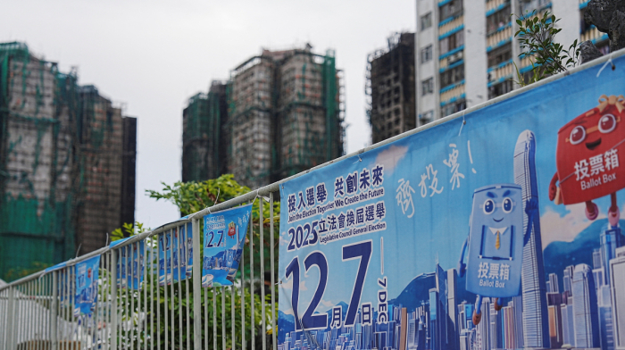 Grief overshadows Hong Kong polls as city mourns deadly tower block blaze