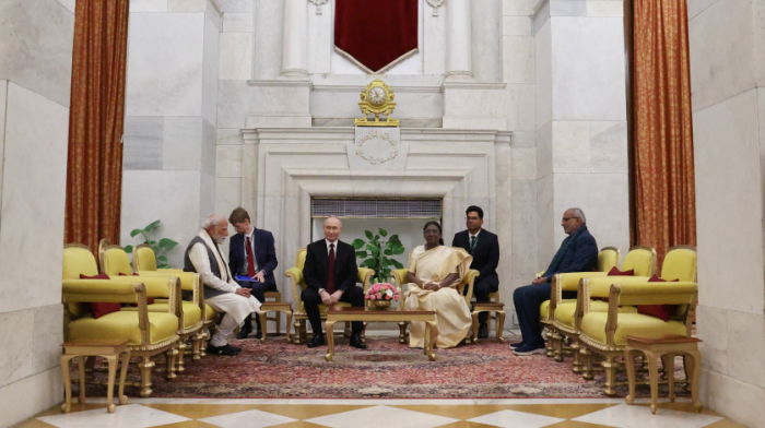 Putin concludes India visit with pledges to boost trade and defence ties