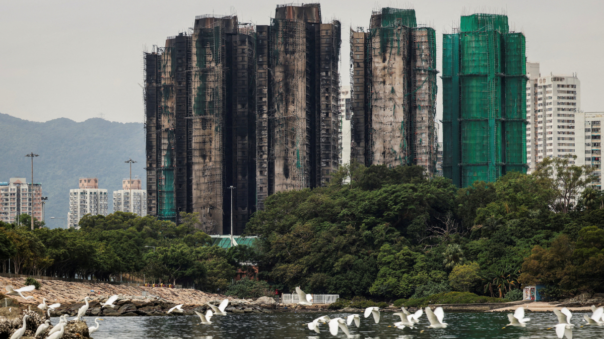 China warns foreign media in Hong Kong over fire coverage