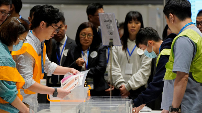 Turnout near record low at Hong Kong election amid anger over deadly fire