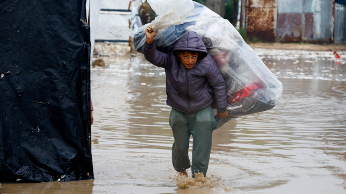 Flooding and freezing conditions hit Gaza as overnight explosion reported