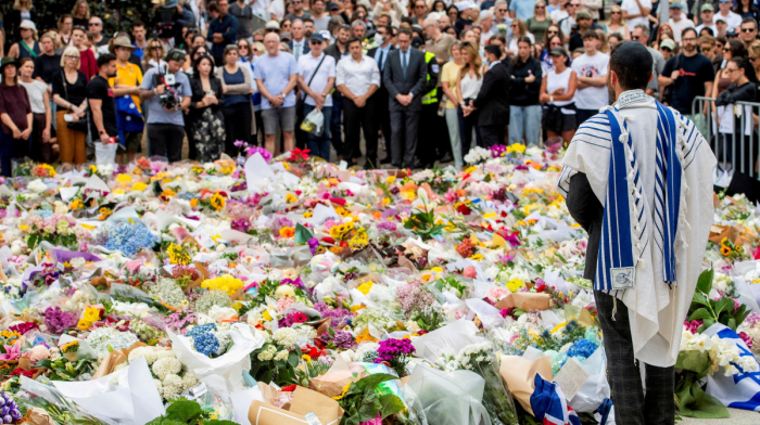 Alleged Bondi Beach gunman charged with 59 offences, as funerals begin
