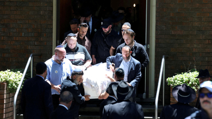 Australia pledges tougher action on hate as nation mourns Bondi Beach shooting victims