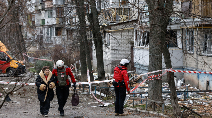 Russia strikes Kyiv, killing two and cutting power to millions