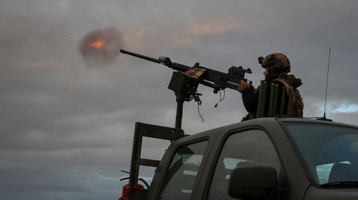 Ukraine says it targets only military and energy sites amid Kherson drone strike claims
