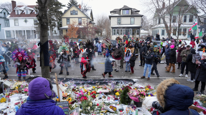 Minneapolis protests: tens of thousands rally after fatal ICE shooting