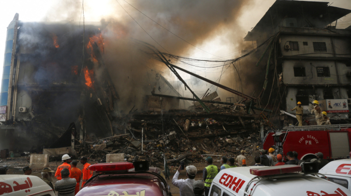 Karachi fire kills 14 as shopping centre gutted in historic district